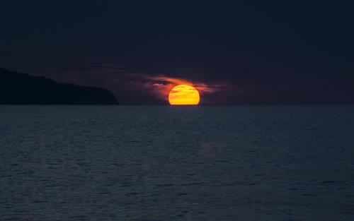 Solnedgång över hav
