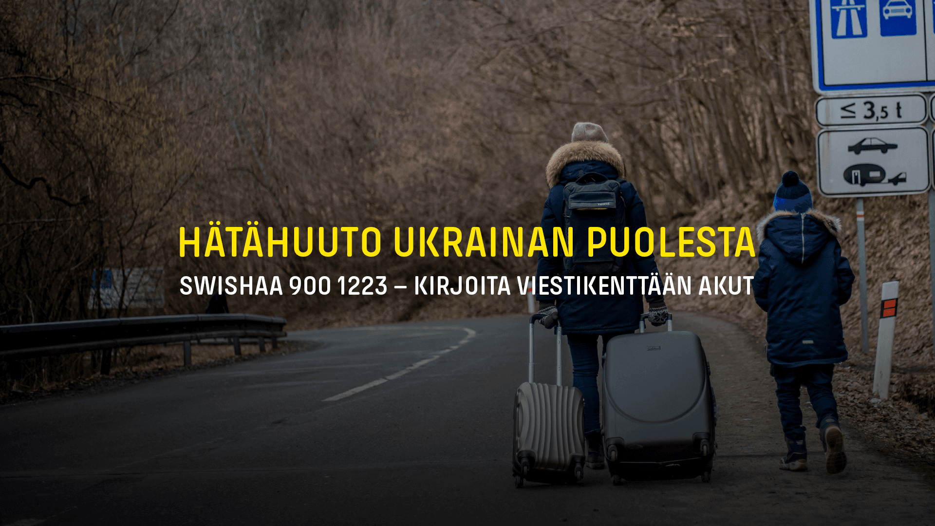 Nainen ja lapsi sotaa paossa.