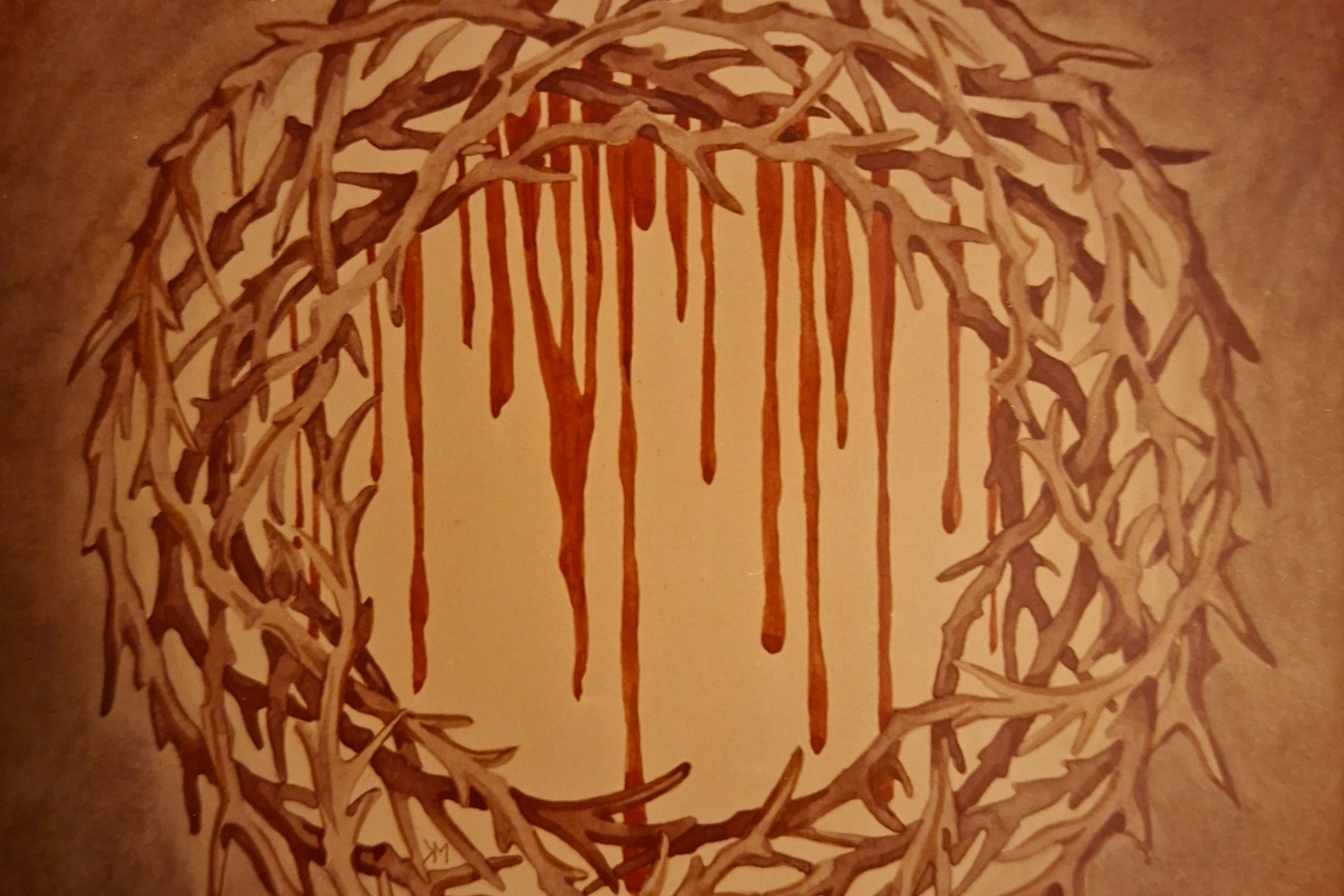 Bilden föreställer en målad bild av en törnekrona med blod som rinner.