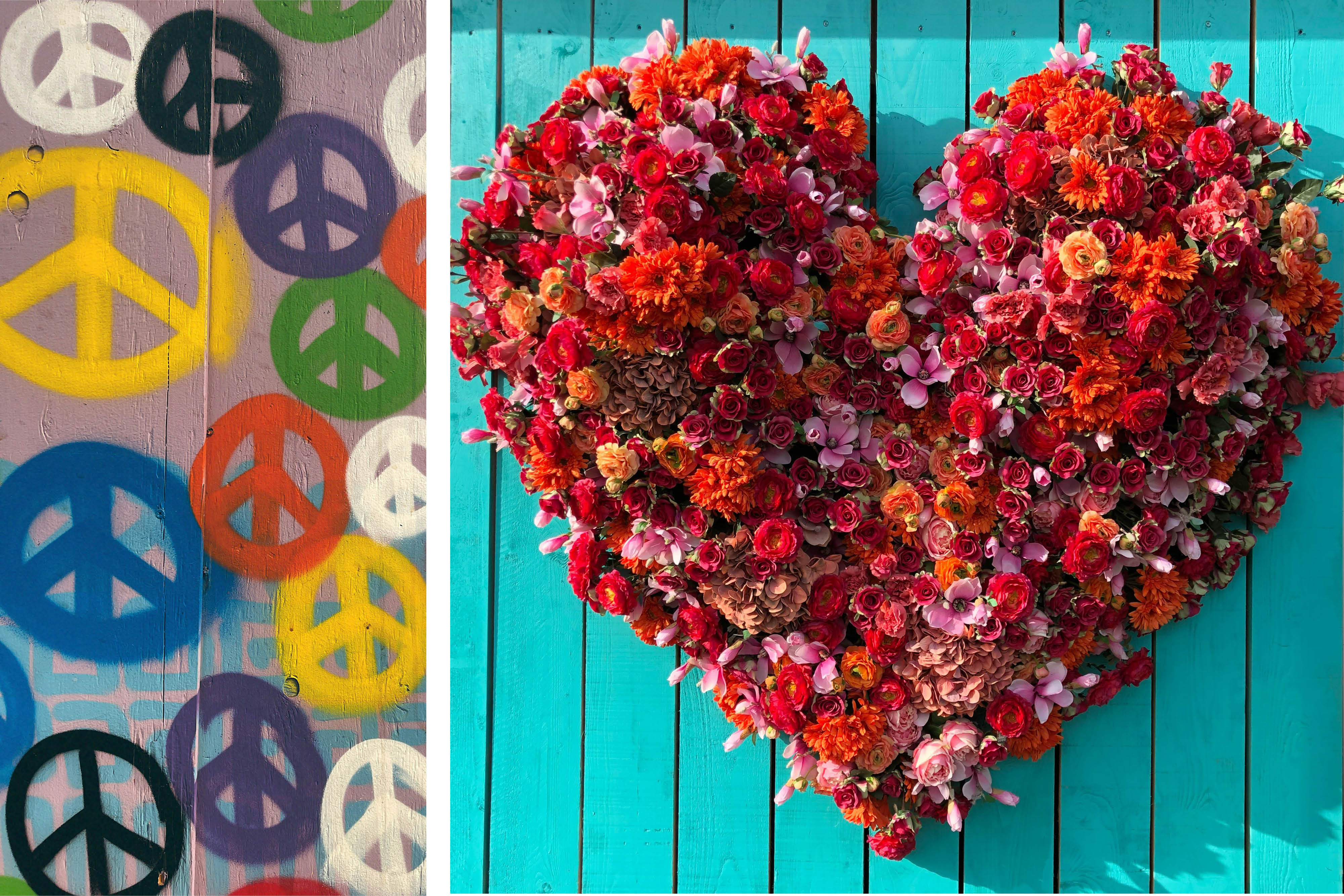 En vägg med målade peacemärken och ett hjärta av blommor.