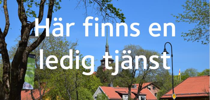 Vy över de gamla brukshusen och Sandvikens kyrka.