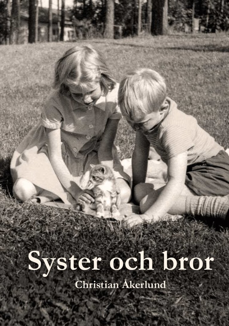 Bild på flicka och pojke med en kattunge