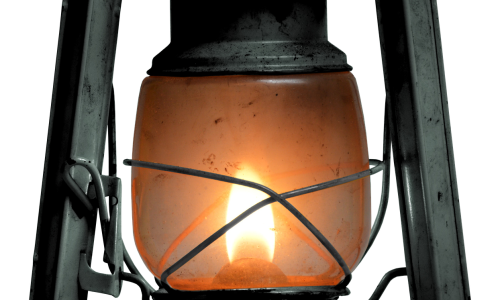 Fotogenlampa med brinnande låga