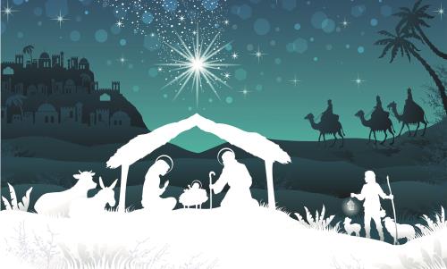 Julkrubba i vitt mot blå himmel