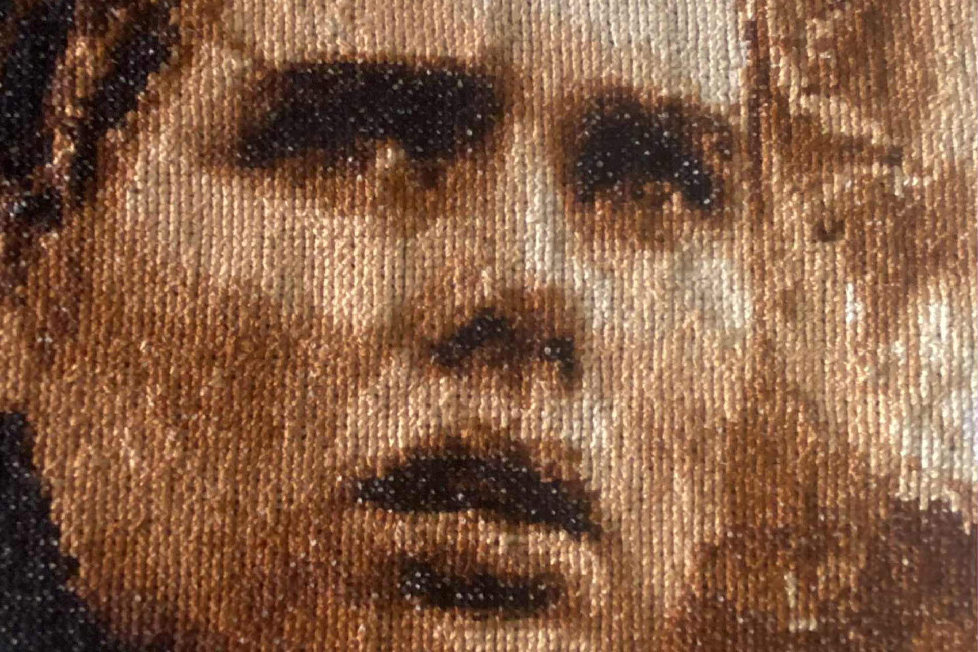 Korsstygnstavla föreställande skådespelaren Liv Ullman.