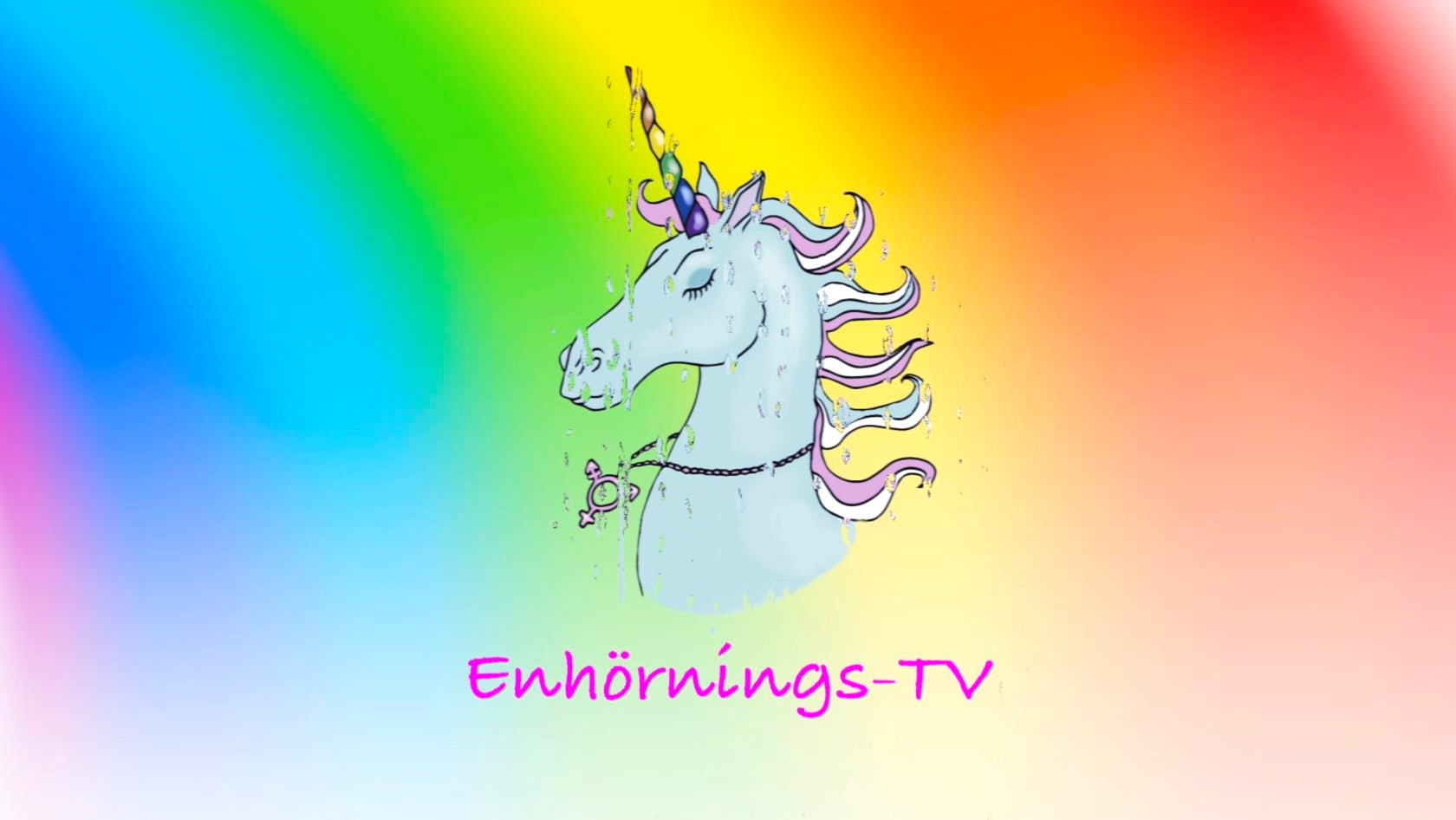 En enhörning mot en regnbågsfärgad bakgrund.