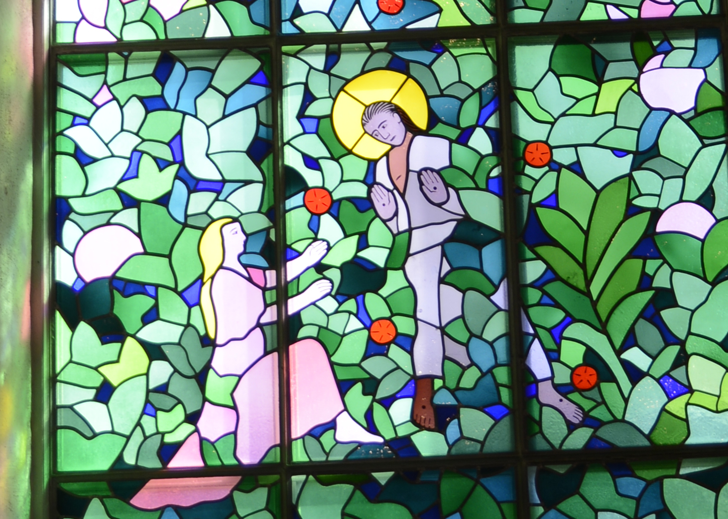 Färgglatt motiv av Jesus och kvinna