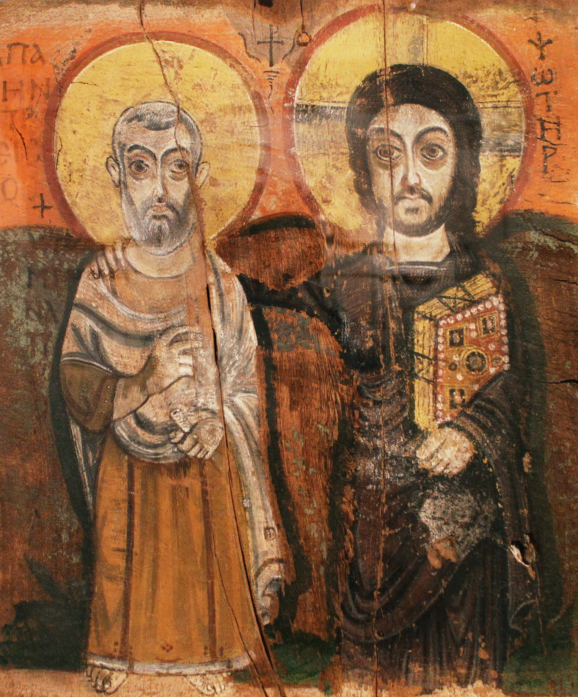 Gammal ikon med helgon och Jesus.