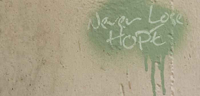 Graffiti med texten: Never lose hope